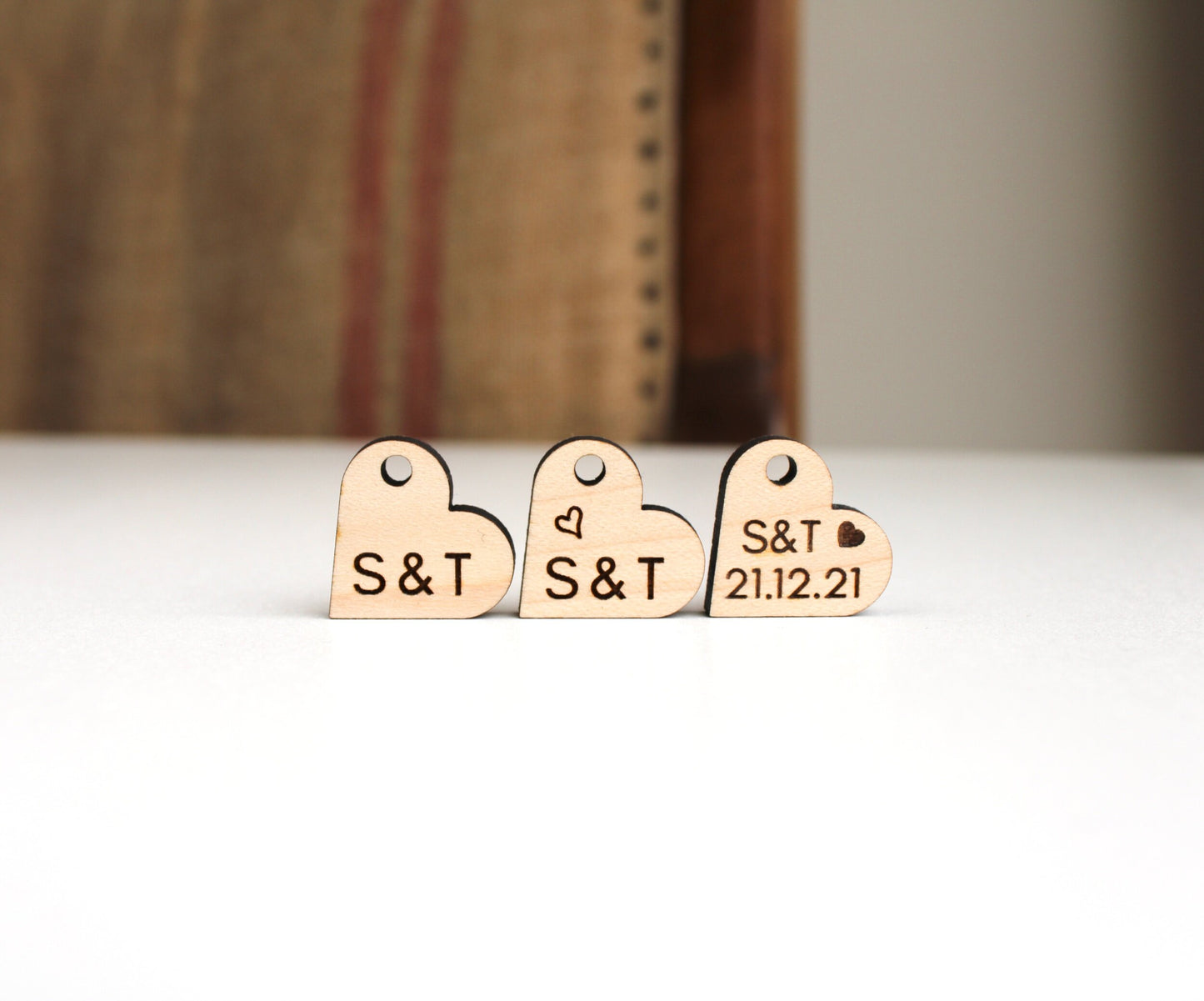Wooden wedding favour tags engraved with initials