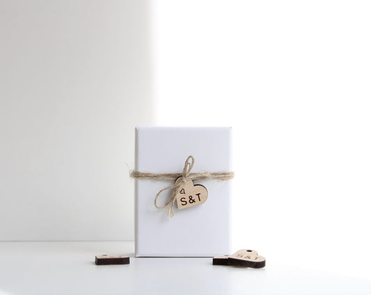 Wooden wedding favour tags engraved with initials and heart