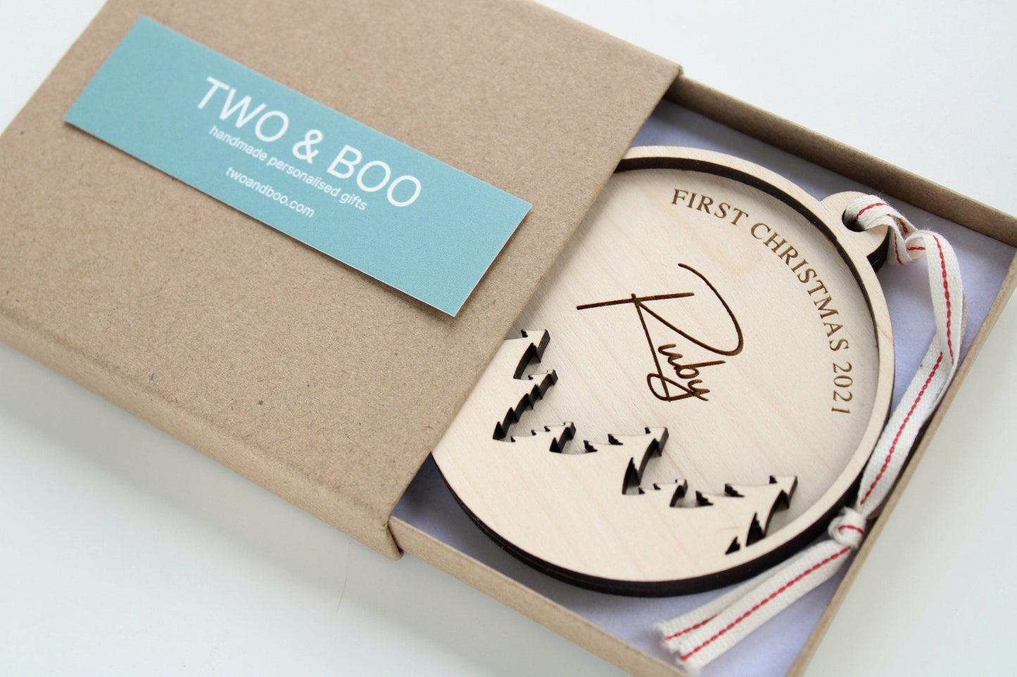 First Christmas bauble decoration with tree design