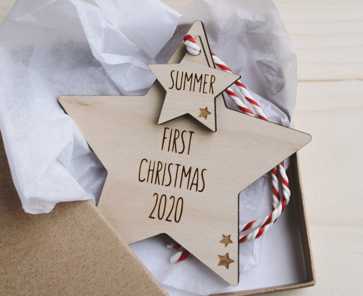 First Christmas wooden star decoration