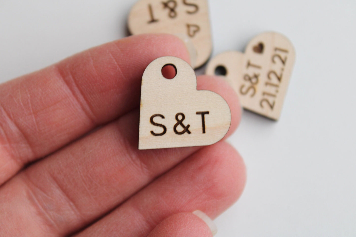 Wooden wedding favour tags engraved with initials