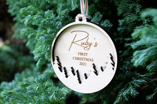 First Christmas bauble with tree design